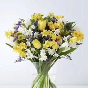 A vibrant Daffodils, Tulips, Hyacinths Flower Bouquet arranged in a sophisticated style for seasonal gifting.